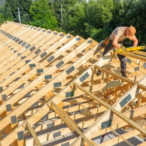 construction-worker-carpenter-measuring-roof-truss-2025-08-25-18-27-48-utc