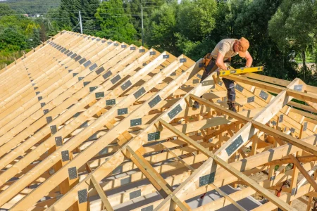 construction-worker-carpenter-measuring-roof-truss-2025-08-25-18-27-48-utc